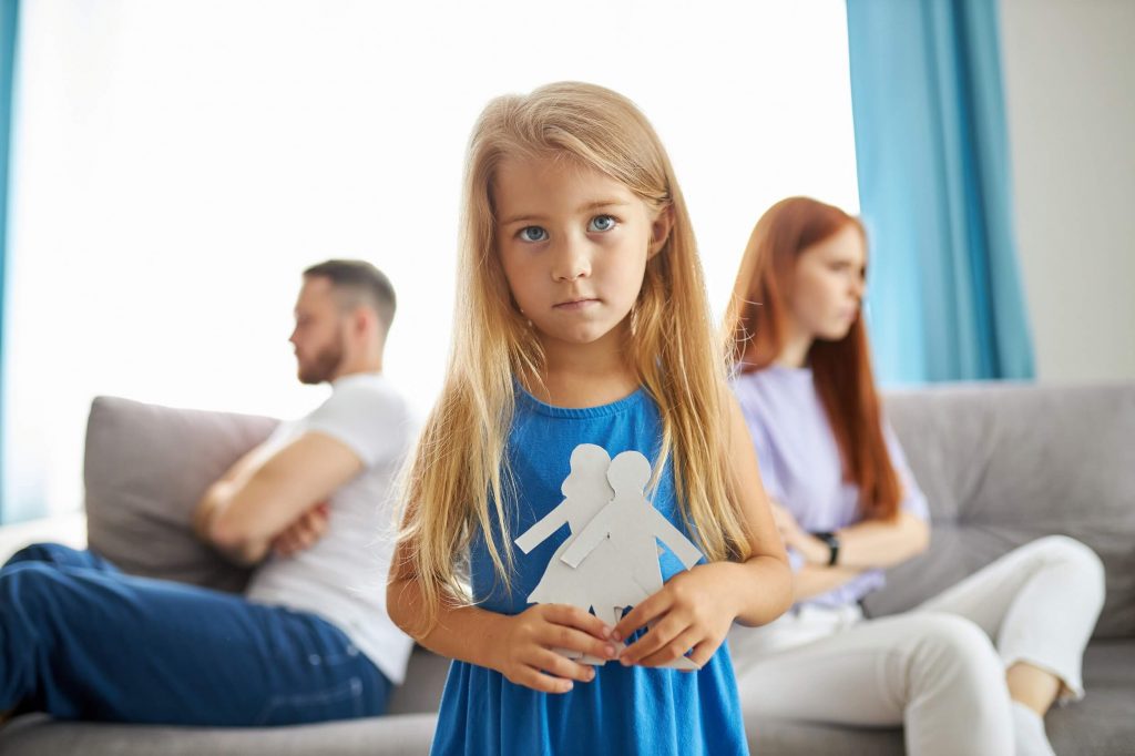 Spouse with child waiting for divorce to end
